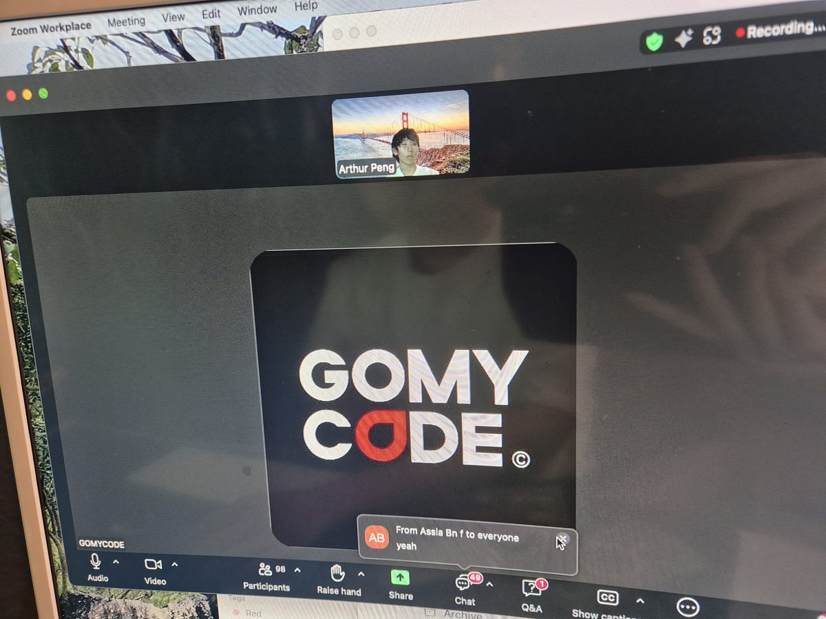 A GoMyCode class on screen with Arthur presenting